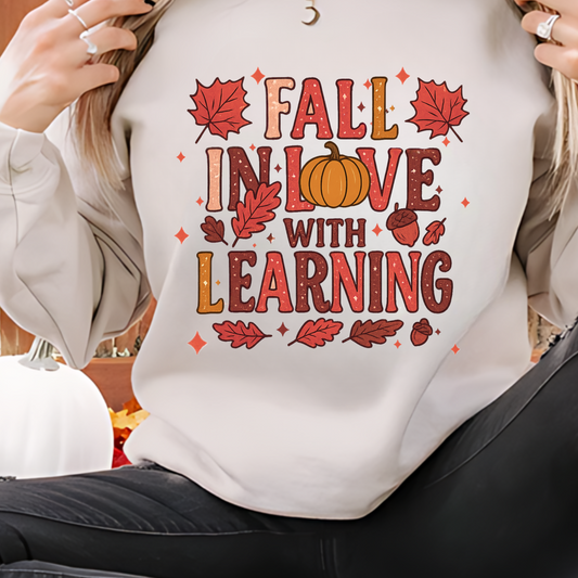 Fall in Love with Learning Crewneck Sweatshirt - Cozy Unisex Fall Apparel, Autumn Gift, Teacher Gift, Seasonal Fashion